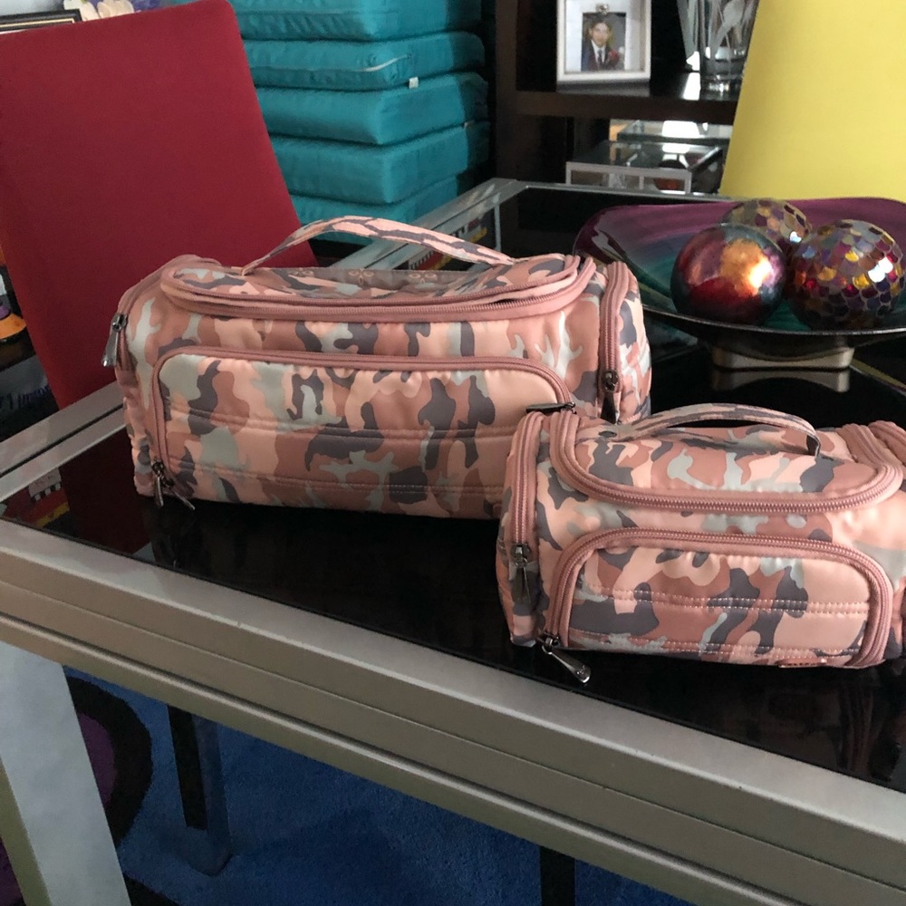 Set of two travelers accessories carriers.  XL and Mini pink camo.
